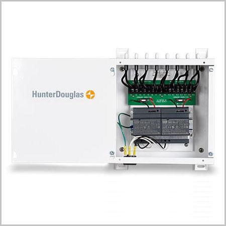 A white box with many wires connected to it.